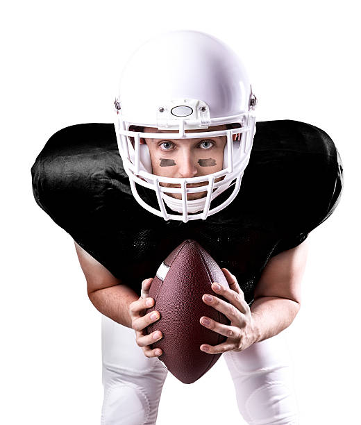 istock Football Player on black uniform isolated on white background 487117602