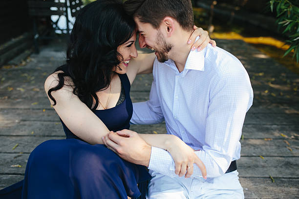 istock man and woman at the lake 487120970