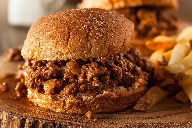 Homemade BBQ Sloppy Joe Sandwiches Homemade BBQ Sloppy Joe Sandwiches with Fries sloppy joes stock pictures, royalty-free photos & images