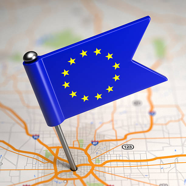 istock European Union Small Flag on a Map Background. 487121073