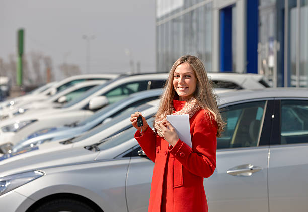istock girl and car 487122039