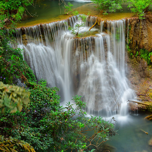 Waterfall in deep forest, Kanchanaburi province, Thailand stock photo