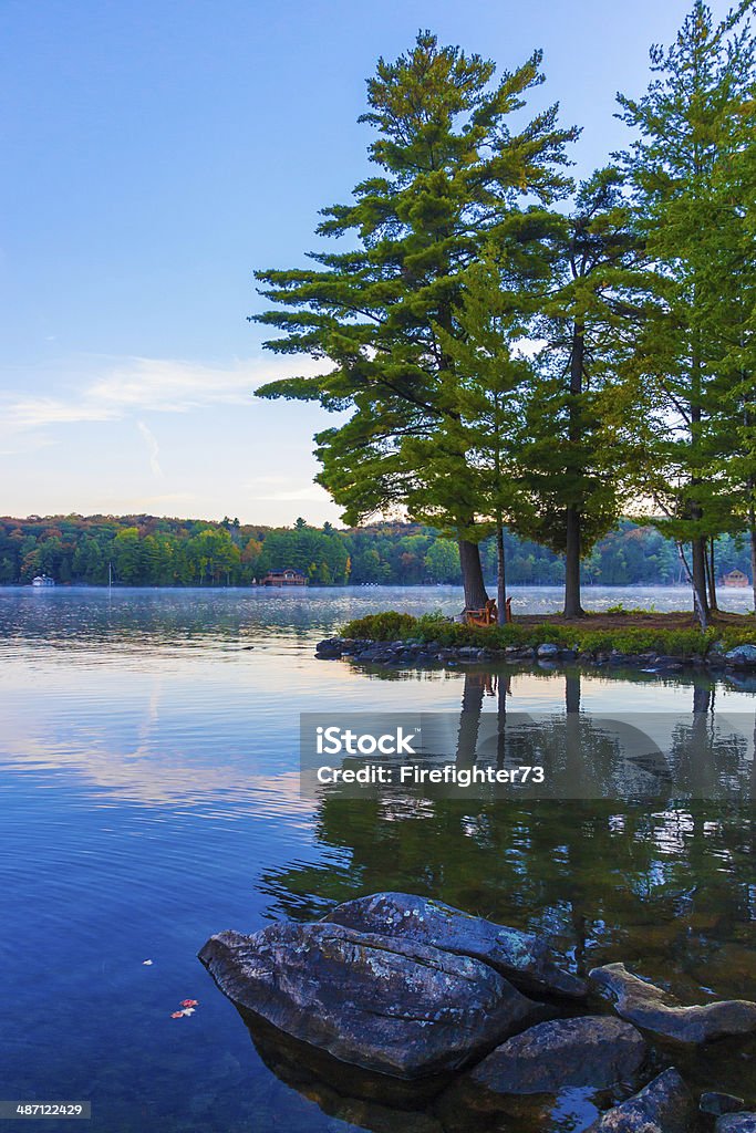 Our Spot Our spot looking out at Lake Joseph in the Muskoka's in Ontario, Canada. Adirondack Chair Stock Photo