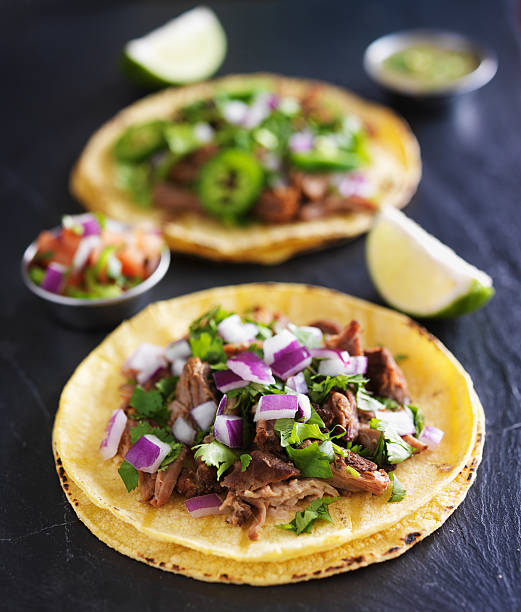 istock authentic mexican tacos with carnitas and barbacoa 487123542