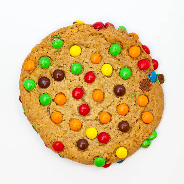 istock Cookie topped with colorful chocolate candies 487123953