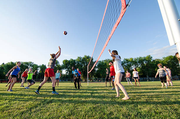 Moorhead, Minnesota, United States - August 22, 2014: Several students playing volleyball during homecoming week at Minnesota State University of Moorhead. 
