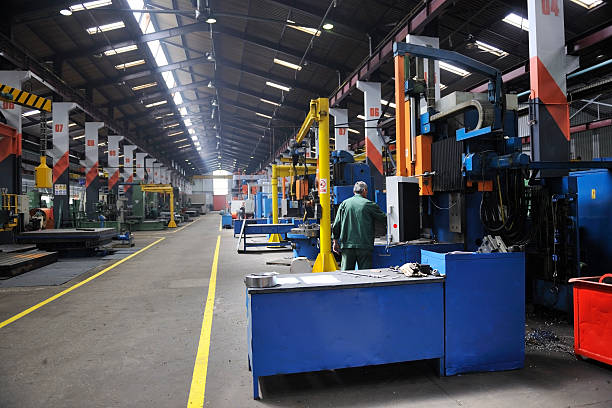 istock workers people in factory 487124689