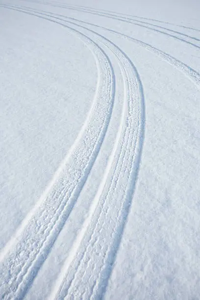 Photo of car track on snow