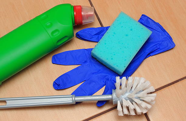 istock Accessories for cleaning bathroom on ceramics flooring 487133044
