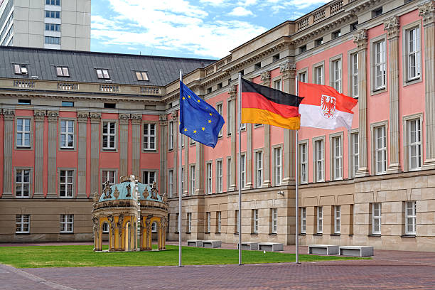 Landtag Branderburg in Potsdam, Germany The flags of European Union, Germany and Branderburg in front of Landtag Branderburg in Potsdam, Germany brandenburg state stock pictures, royalty-free photos & images