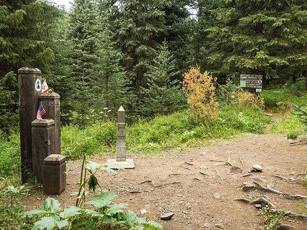 Northern terminus of the PCT Monument 78 and the Canada/ US border marks the northern end of the Pacific Crest Trail pacific crest trail stock pictures, royalty-free photos & images