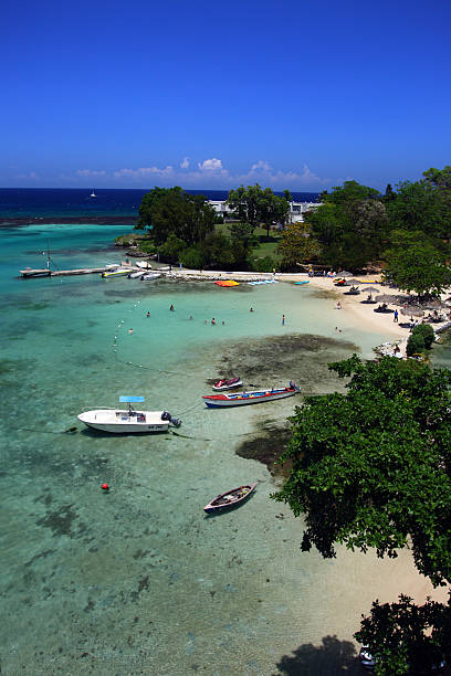Ocho Rios, Jamaica Ocho Ríos is a town on the northern coast of Jamaica, located in the parish of Saint Ann. It is a popular tourist destination, well known for scuba diving and other water sports dunns river falls stock pictures, royalty-free photos & images