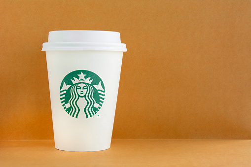 Bangkok, Thailand - Mar 04, 2015: Starbucks take away coffee cup,  Starbucks brand is one of worldwide coffeehouse chains from USA.