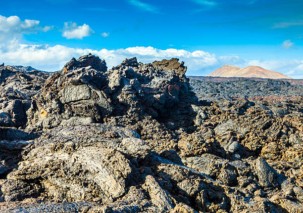 istock Stones of volcanic flow give a beautiful  structure 487138534