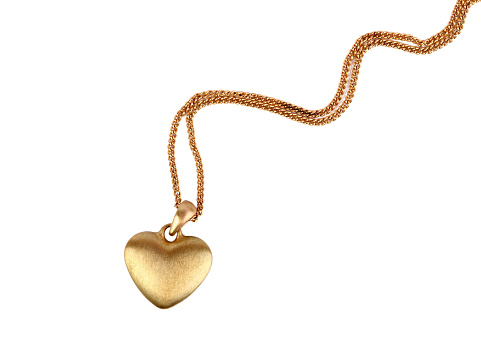 Golden heart pendant isolated on white