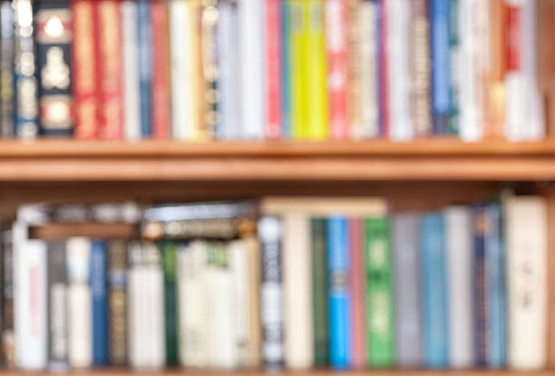 istock unfocused books on bookshelf 487140360