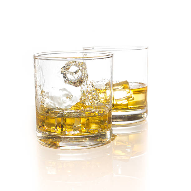 istock whiskey glasses with ice cubes isolated on white set collage 487140608