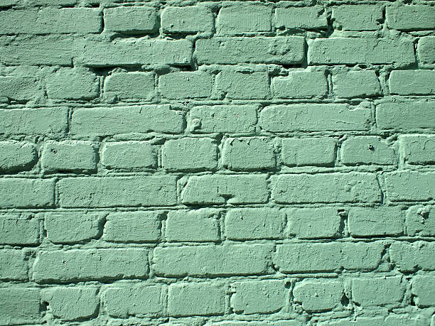istock Fragment of a green brick wall 487143870