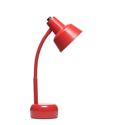 Red color desklamp on white background. Clipping path