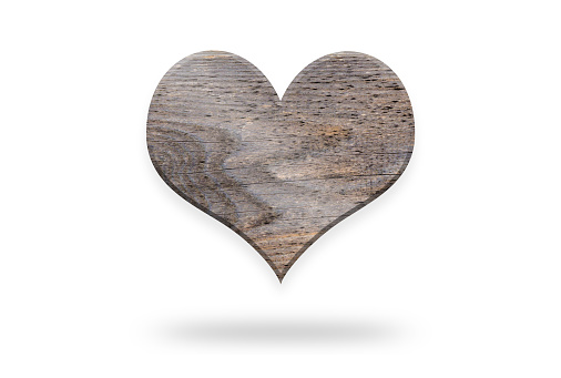 Wooden heart. Christmas ornament isolated on a white background. Stock photo
