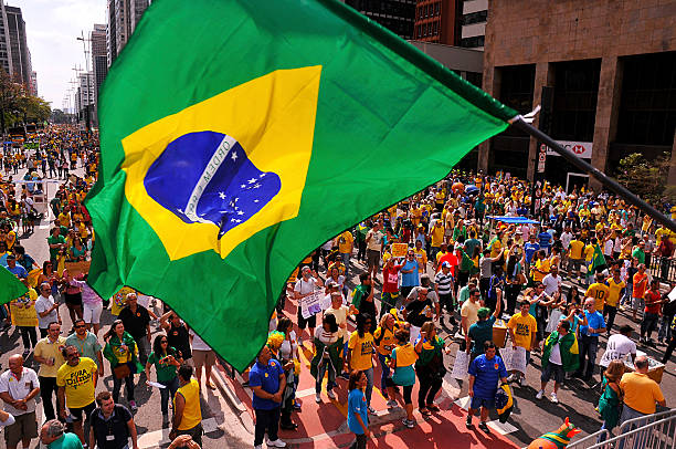 Sao Paulo, Brazil - August 16, 2015: large number of people in the demonstration against the corruption that happened on Avenida Paulista in Sao Paulo, Brazil