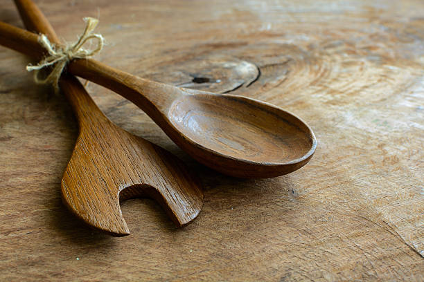 istock wooden spoon and fork on old wooden table 487149180
