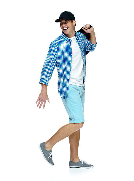 istock Cheerful man holding gym bag and walking 487152470