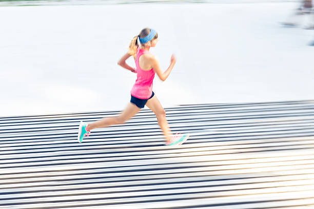 istock Young Caucasian woman running 487152524