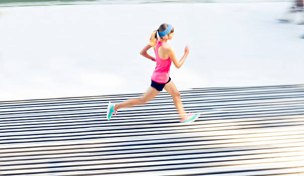 istock Young Caucasian woman running 487152538