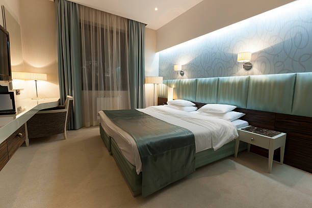 istock Beautiful luxury hotel double bed room 487153019