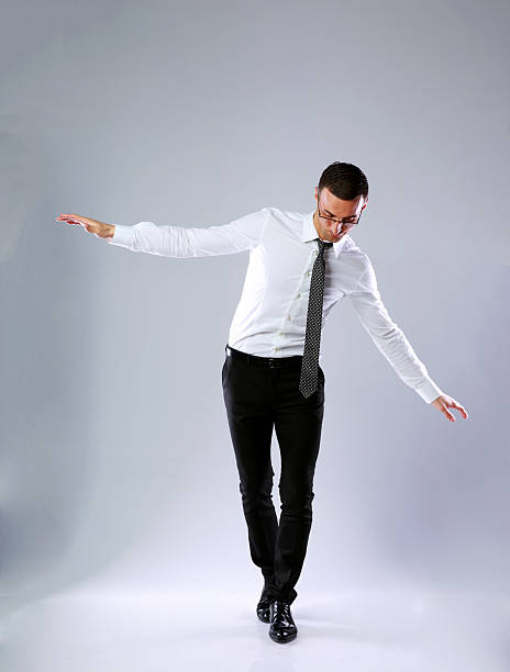 istock Businessman walking on invisible rope 487154011