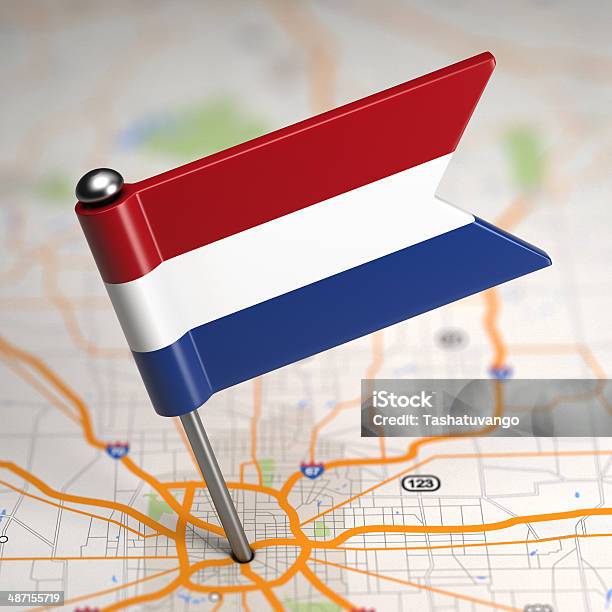 Netherlands Small Flag On A Map Background Stock Photo - Download Image Now - Amsterdam, Backgrounds, Exploration