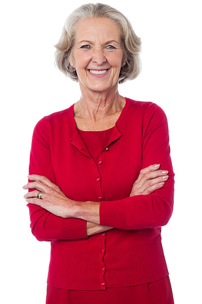 istock Confident senior smiling woman posing 487157097