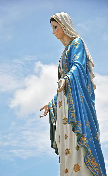 istock Mother mary statue on blue sky 487157323