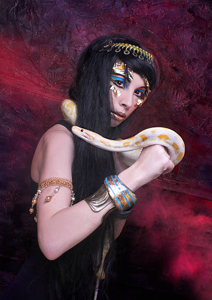istock Woman with snake. 487158003