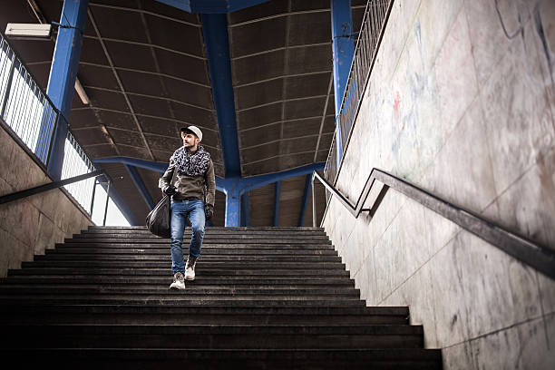istock Low angle view of a passenger moving down the stairs. 487161336
