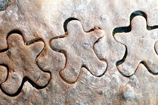 gingerbread cookies with copper cookie cutter stock photo