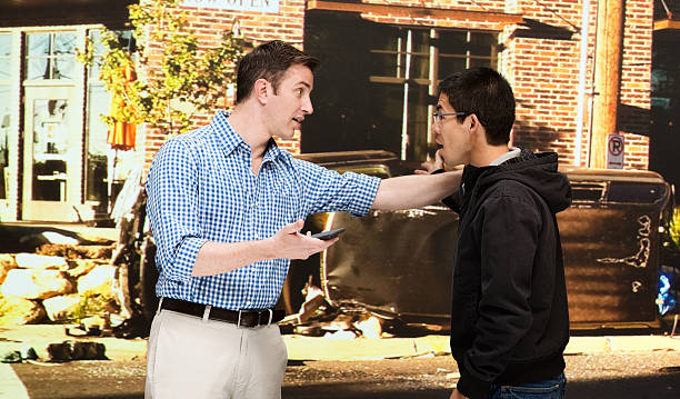 istock Drivers standing a car crash spot 487163136