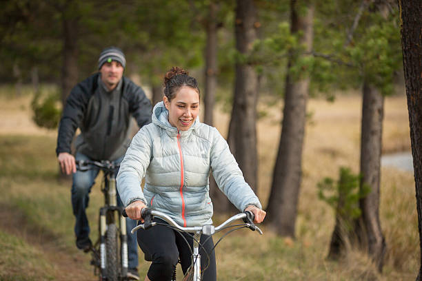 istock Couple enjoying the outdoors on bikes 487164032