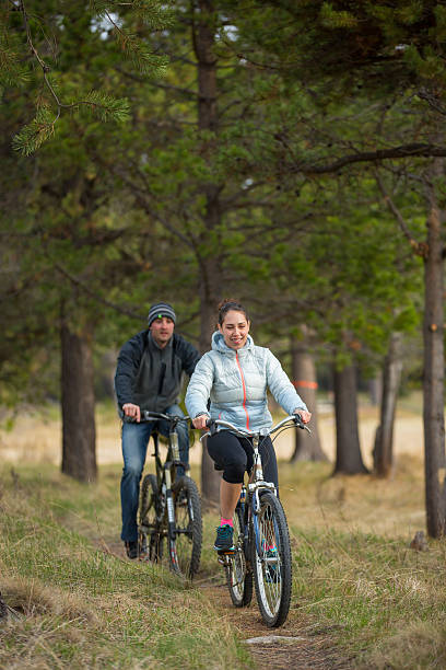 istock Couple enjoying the outdoors on bikes 487166262