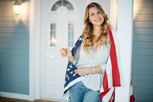 istock Woman in front of a house. 487166824