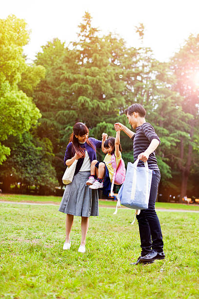 istock Family having a walk outdoors in summer, Tokyo 487168146
