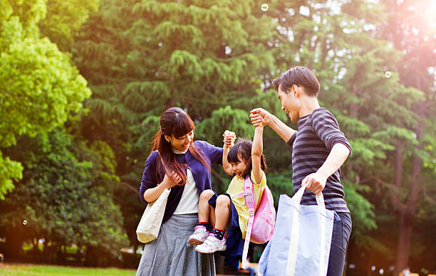 istock Family having a walk outdoors in summer, Tokyo 487168220