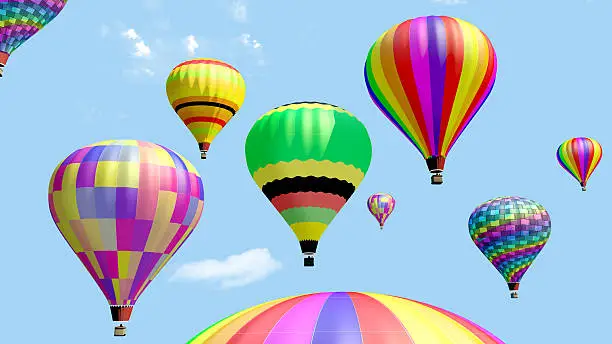 Photo of Several hot air balloon flying in the blue sky.