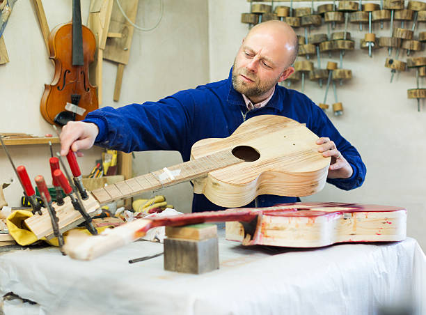 istock Atelier posing with his guitars 487172226