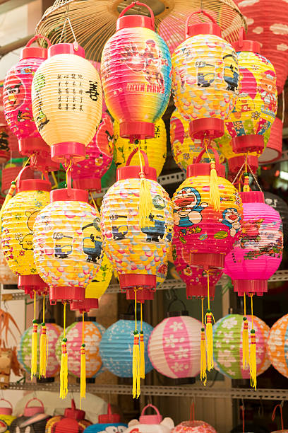 istock Colorful lanterns selling at market for Mid Autumn 487173400