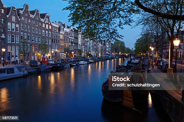 Amsterdam Canal In The Evening Stock Photo - Download Image Now - Amsterdam, Blue Hour - Twilight, Brunch