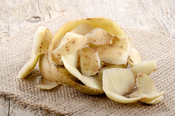 istock potato peel on a jute cloth 487173603