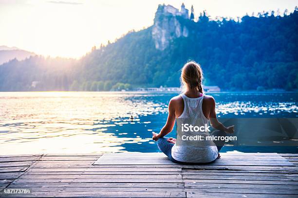 Meditation By The Lake Stock Photo - Download Image Now - Meditating, Zen-like, Yoga