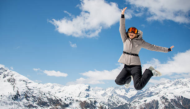 istock Winter woman jumping 487174187